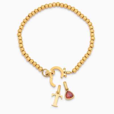 Pulsera con dije de inicial con piedra de nacimiento y cuentas