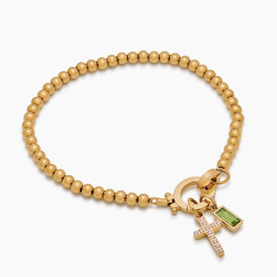 Pulsera con dije de cruz y cuentas de piedra de nacimiento