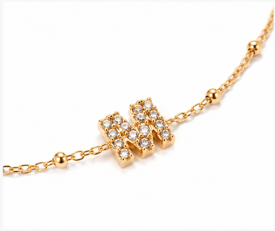 Pulsera inicial "M" con circonitas